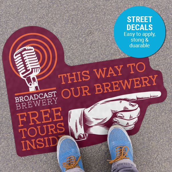 Guide traffic into your storefront with street decals incentivizing in-person visits
